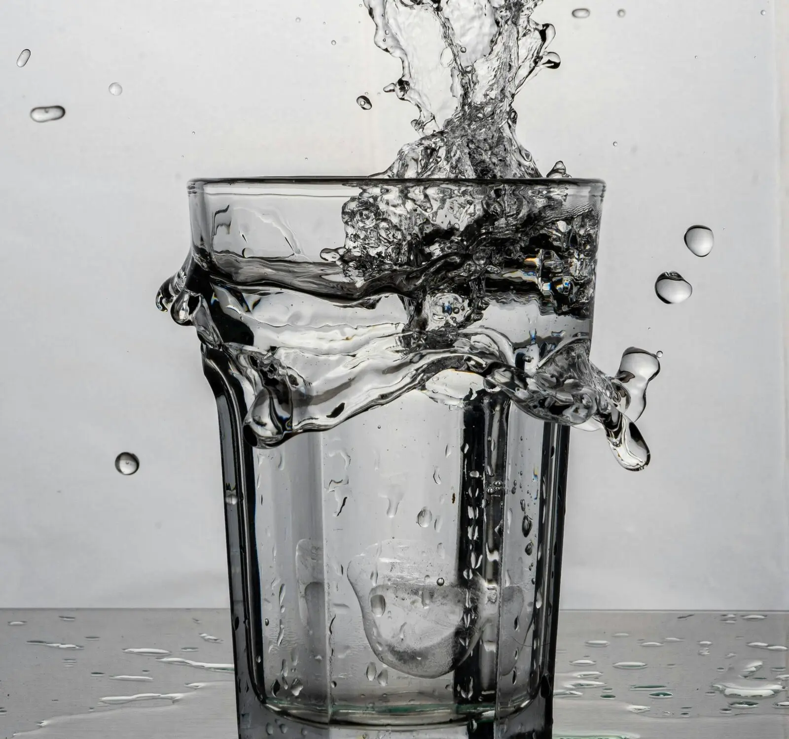 Water splashing out of a glass